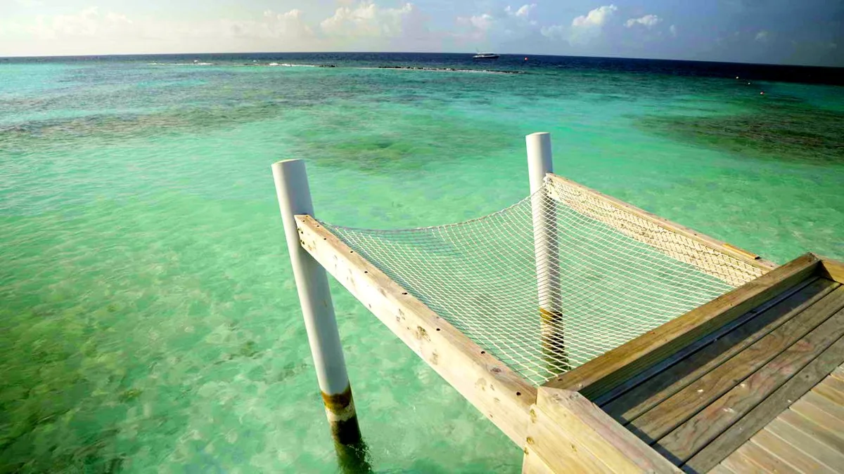 An overwater hammock above the lagoon