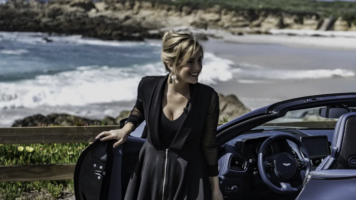 Sophie Ashley and the Aston Martin DB11 Volante on the California coast
