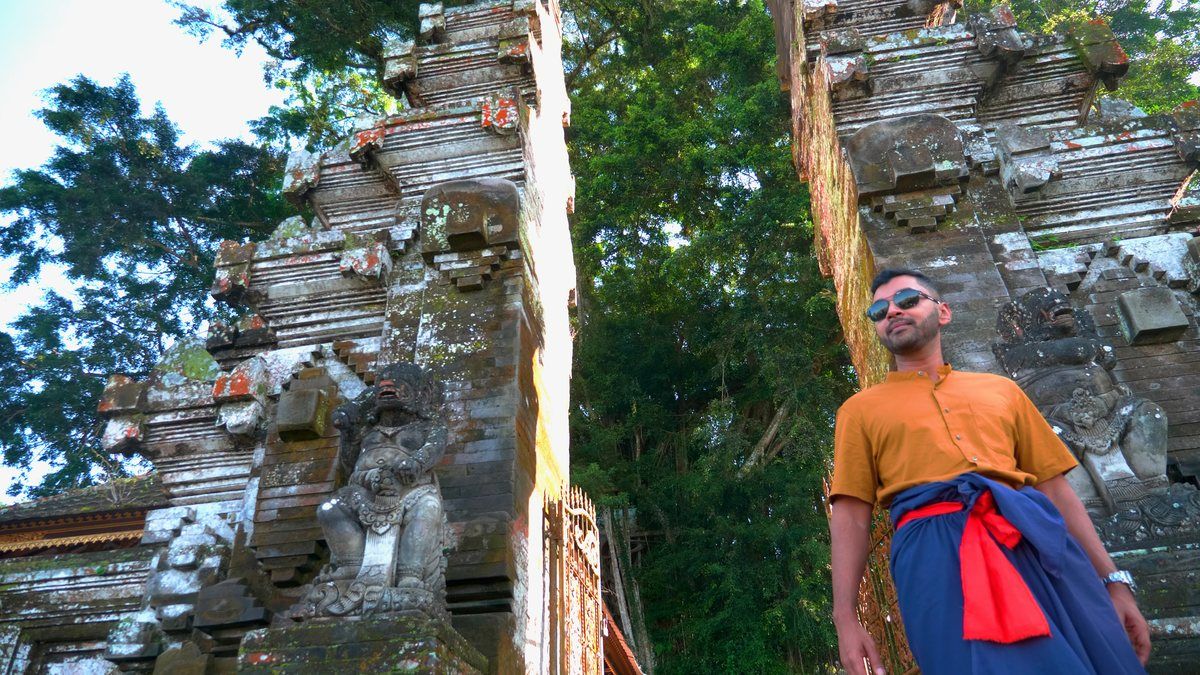 Sashi De at a highland temple gate, Bali