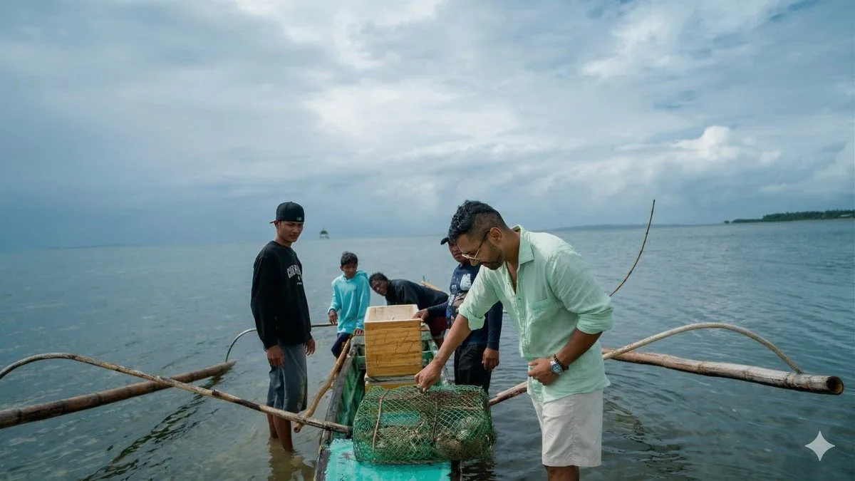 Sashi De checks the haul of the day — rock lobster, mahi mahi, Spanish mackerel and a giant trevally