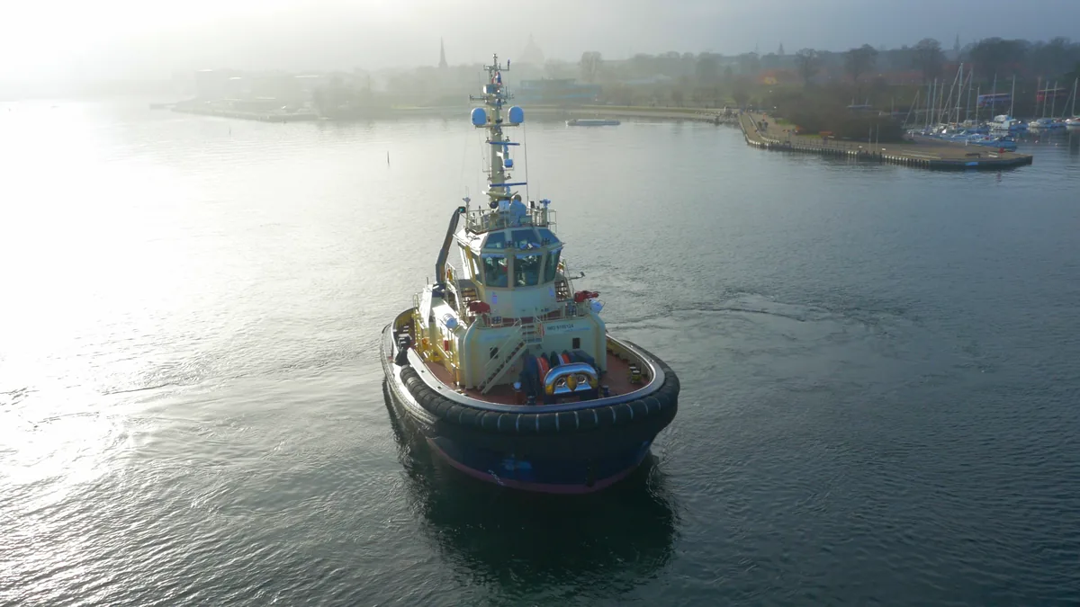 The tug under way in Copenhagen harbour, shot from the air
